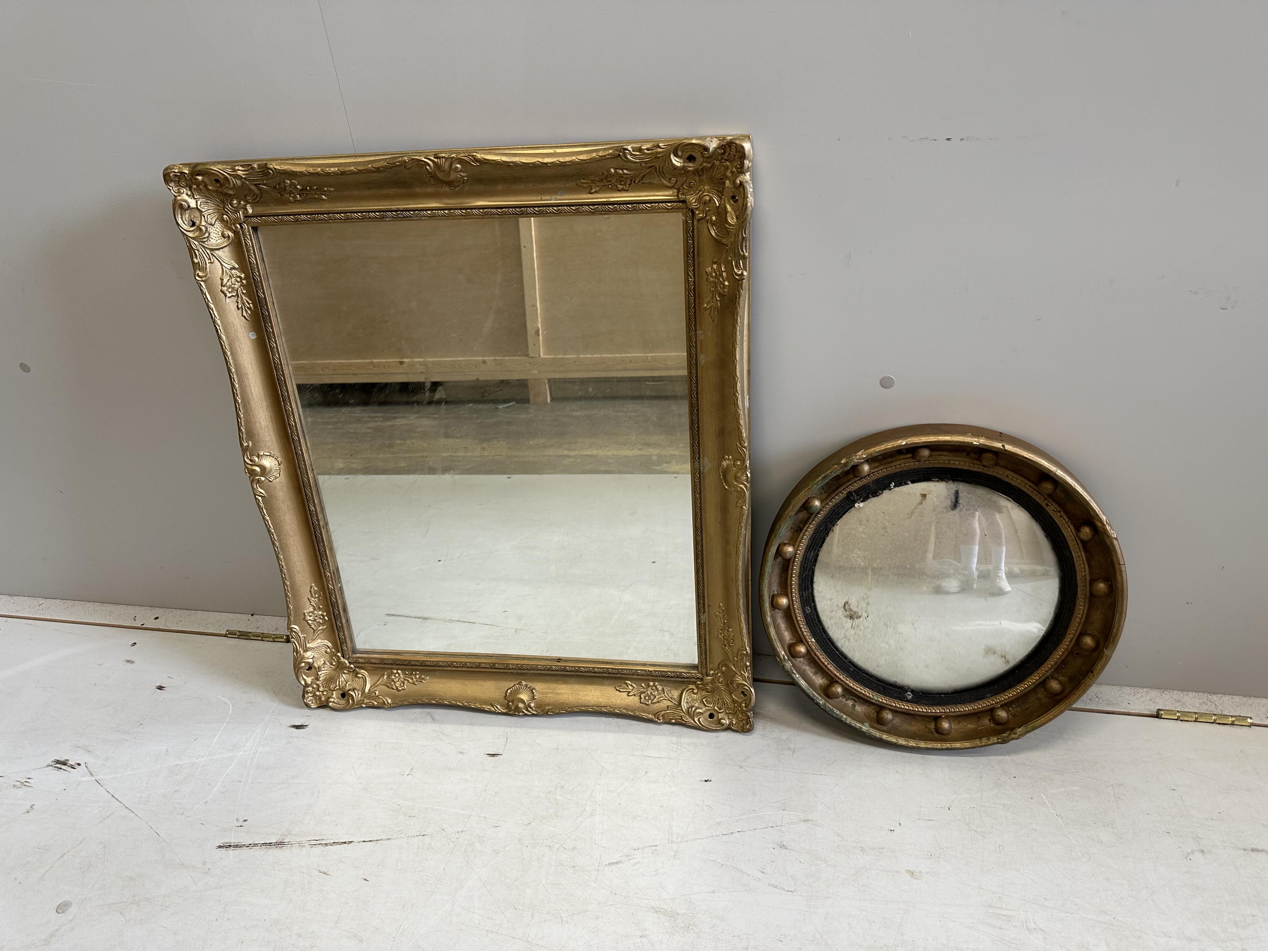 A rectangular gilt composition wall mirror, width 64cm, height 74cm together with a circular convex wall mirror. Condition - poor-fair